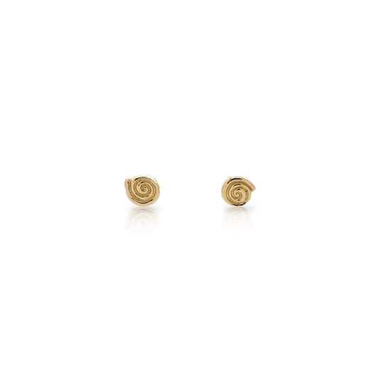 Small gold labyrinth stud earrings on a white background.