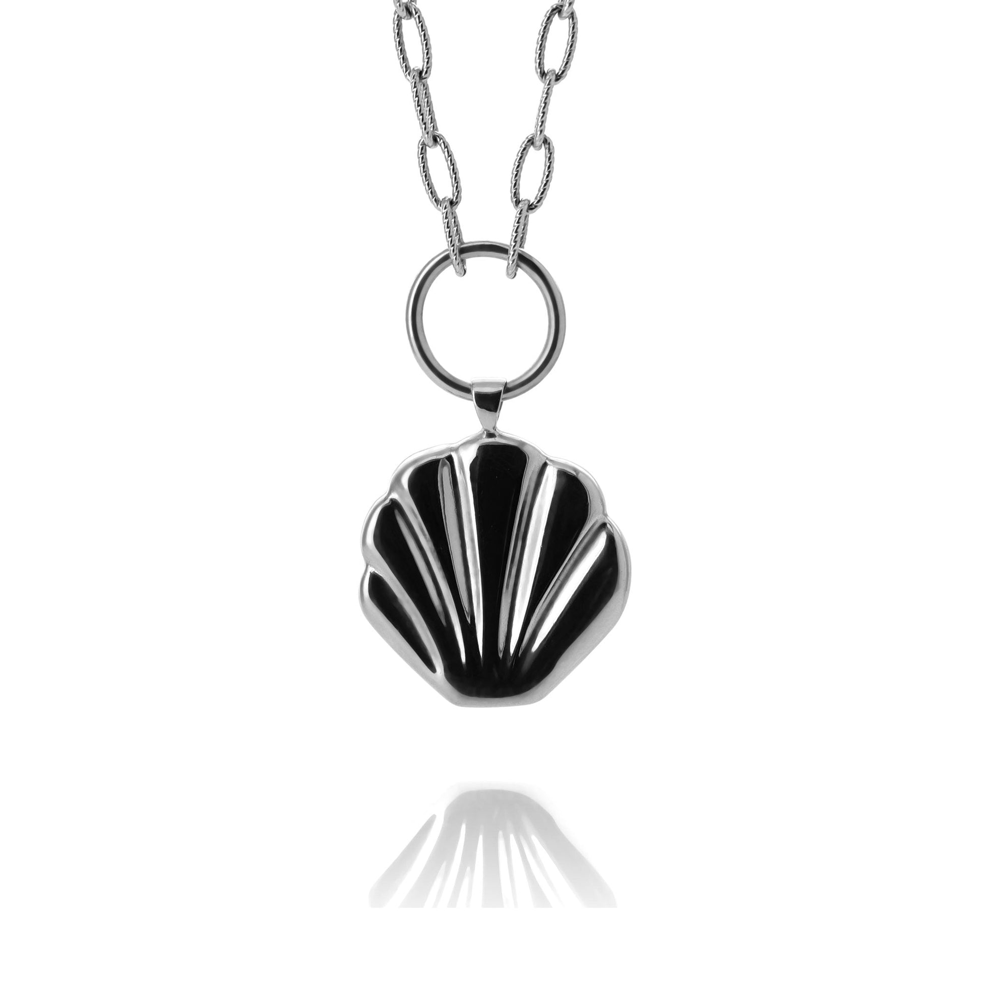 Silver coin pendant necklace in the shape of a shell on a white background.