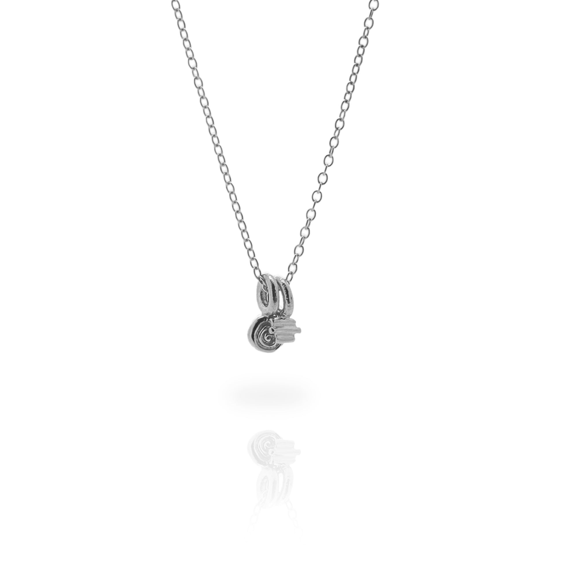 Two small silver charms on a fine silver chain, on a white background.