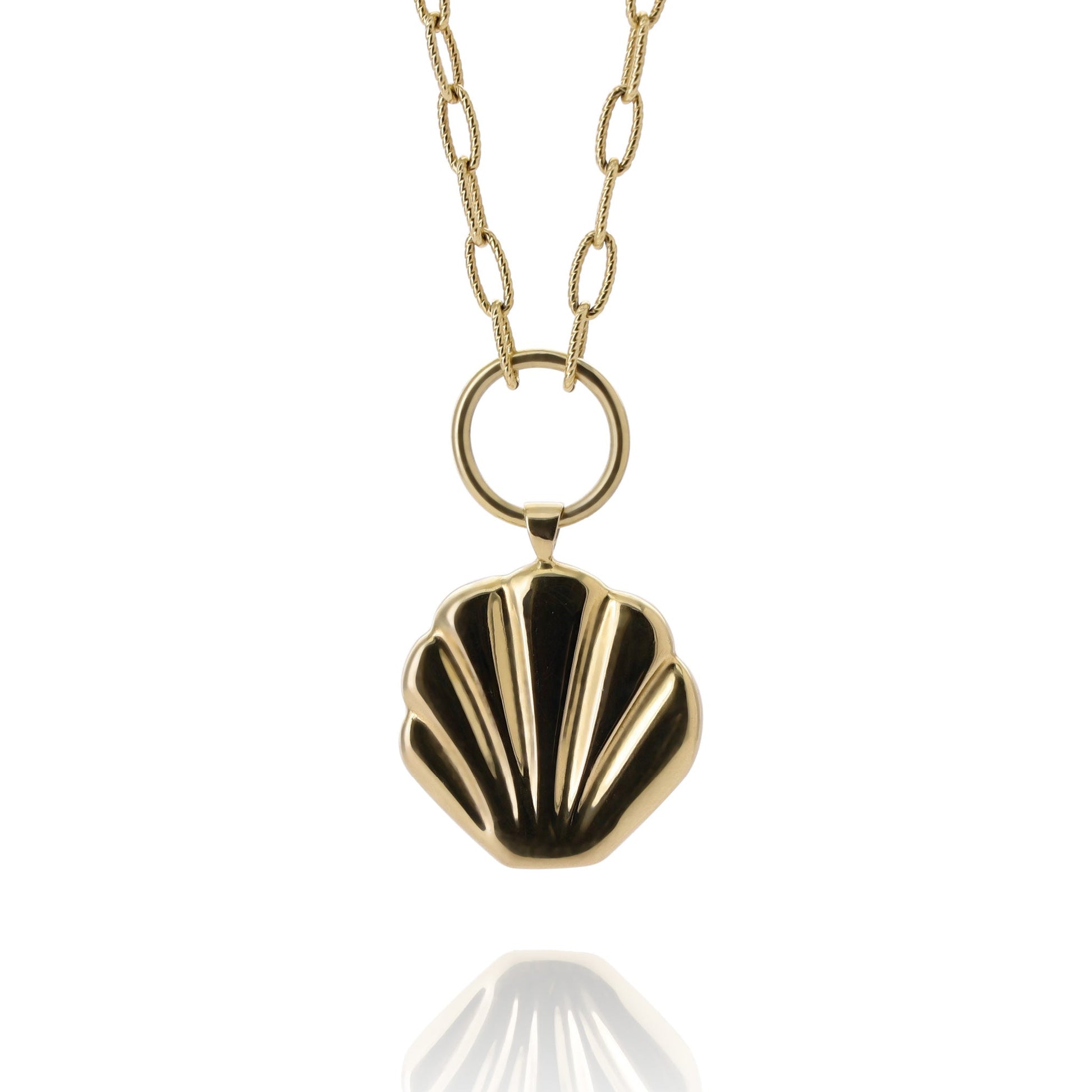 Gold coin pendant necklace in the shape of a shell on a white background.